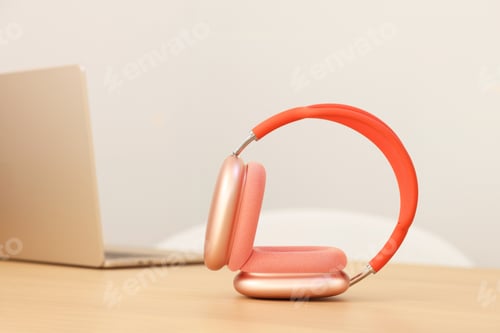 Preview: Modern headphones and laptop on wooden table