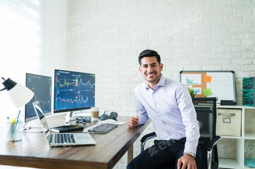 Preview: Confident Handsome Young Stock Broker Working At Home