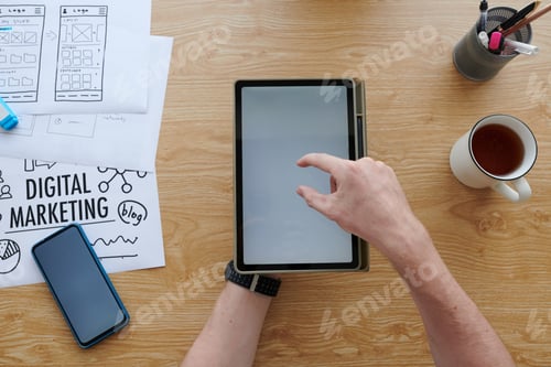 Preview: Marketing Manager Working on Tablet