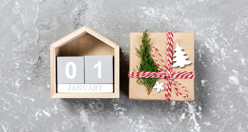 Preview: Calendar banner with date 1 january and gift boxes on color background. Christmas