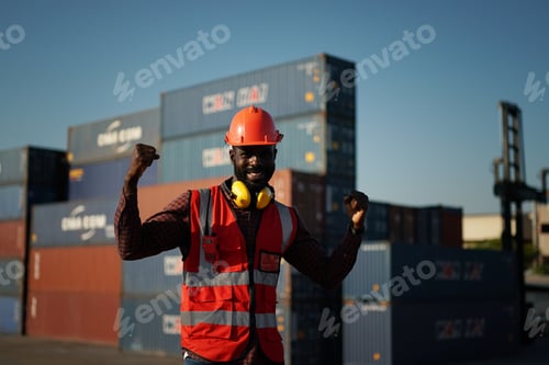 Preview: Foreman control loading Containers box from Cargo freight ship for import export.
