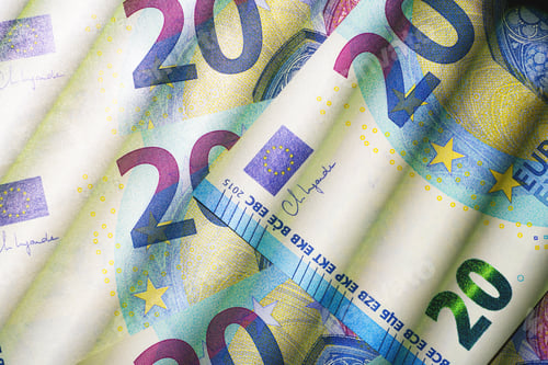 Preview: Twenty Euro currency bills background. Pile of banknotes on the table.