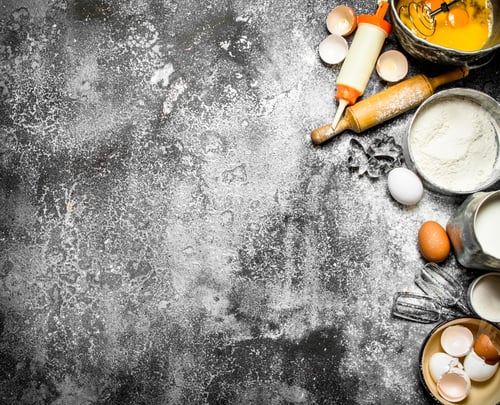 Preview: Baking background. A variety of ingredients for baking on rustic background.