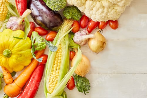 Preview: Top view of different fresh farm vegetables on the white background