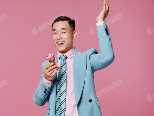 Preview: Cheerful man blue suit ice cream pleasure emotions close-up