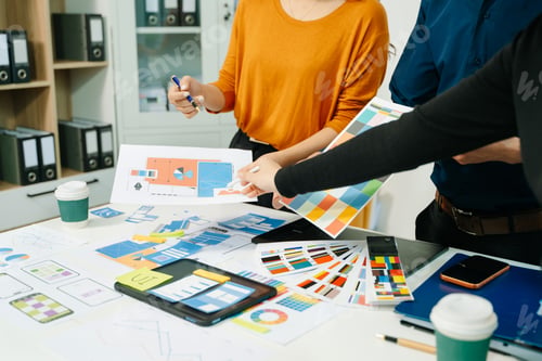 Preview: UX developer and ui designer brainstorming about mobile app interface wireframe design with