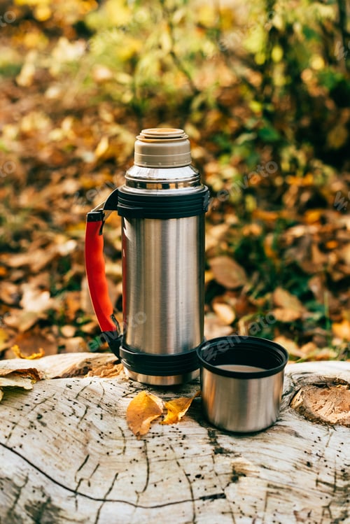 Preview: metallic camping thermos on beautiful autumnal background