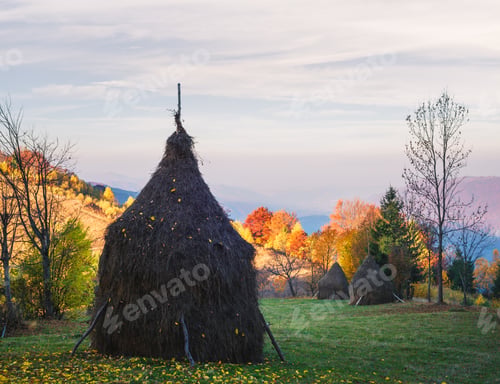 Preview: Autumn landscape with a haystack in the mountains