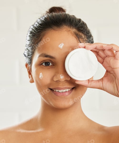 Preview: Beauty is a deeply personal journey. Shot of young woman posing with facial moisturiser at home.