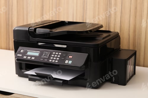 Preview: New modern printer on white table against wooden background