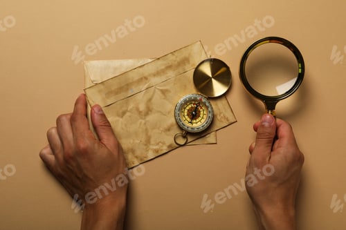 Preview: Columbus Day. Vintage compass with old envelopes