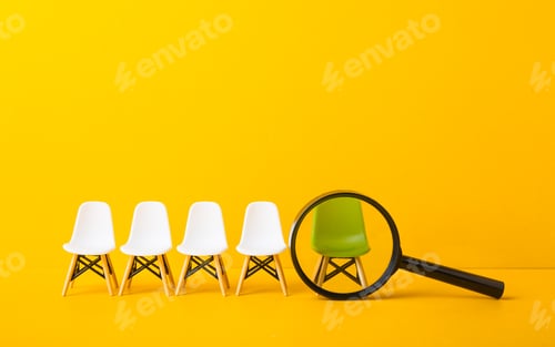 Preview: Green chair standing out from the crowd. Business concept.