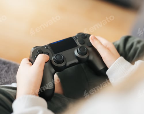 Preview: Girl playing on games console