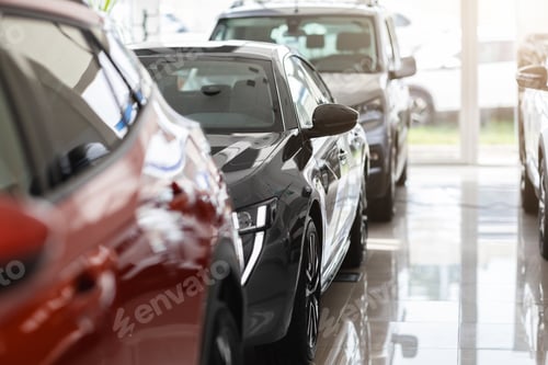 Preview: Closeup of brand new luxury automobiles in vip showroom