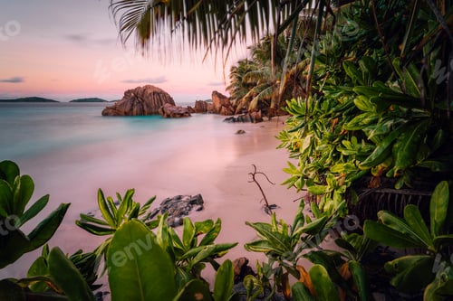 Preview: Paradise exotic beach on La Digue Island, Seychelles. Long Exposure during amazing sunset