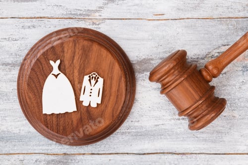 Preview: Wedding costumes and wooden gavel.