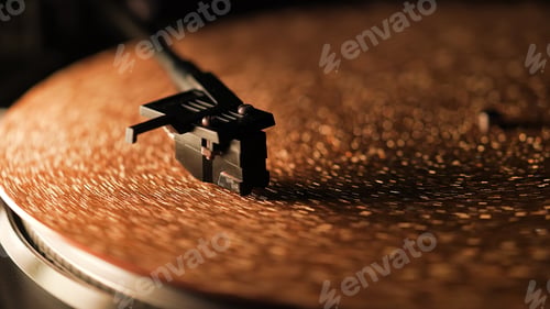 Preview: Retro-styled spinning gold record vinyl player. Close up glitter surface.Rotating vintage phonograph
