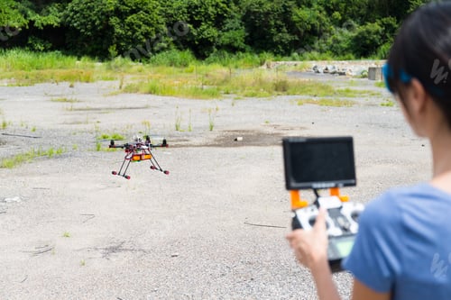 Preview: Woman flying drone