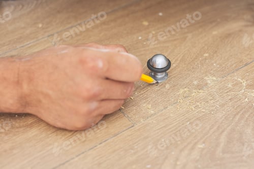 Preview: Construction and repair, doorstop, installation of door stop tools on floor with tool