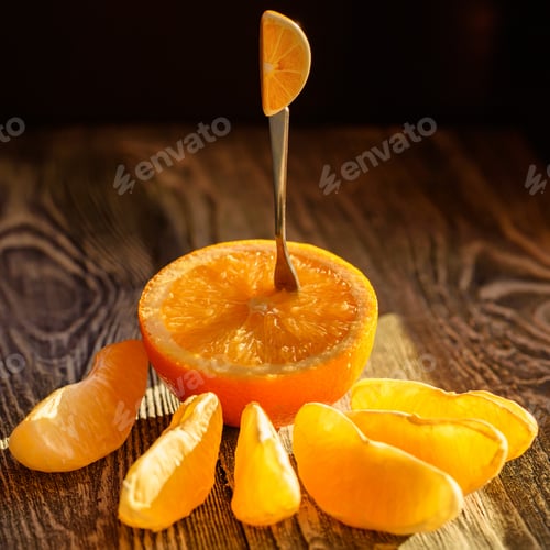 Preview: Ripe juicy fresh oranges, whole, cut and slices