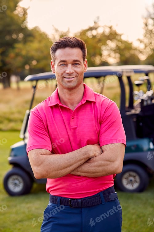 Preview: Portrait Of Smiling Male Golfer Standing By Buggy On Golf Course