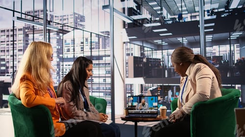 Preview: Diverse general managers conducting a video call with the shareholder