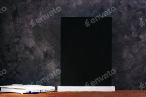 Preview: Chalk board mockup. Blackboard menu easel wooden table dark background. Copy space for text content.
