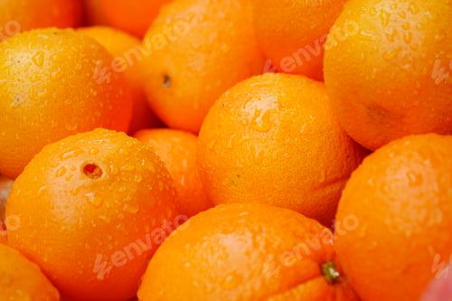 Preview: close up of slice of orange fruits in a bowl
