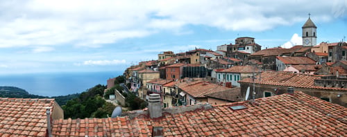 Preview: Beautiful view of building roofs near the shore in Capoliveri, Italy