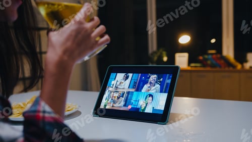 Preview: Young Asia lady drinking beer having fun happy moment night party event online at home.