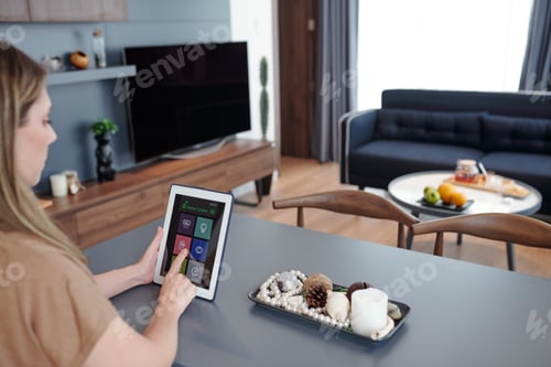 Preview: Woman using home control app