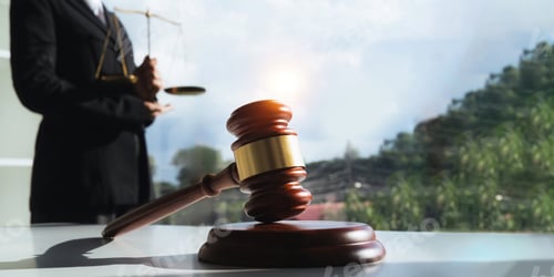 Preview: Lawyer hand concept justice with judge gavel, Businessman in suit or Hiring lawyers in the digital
