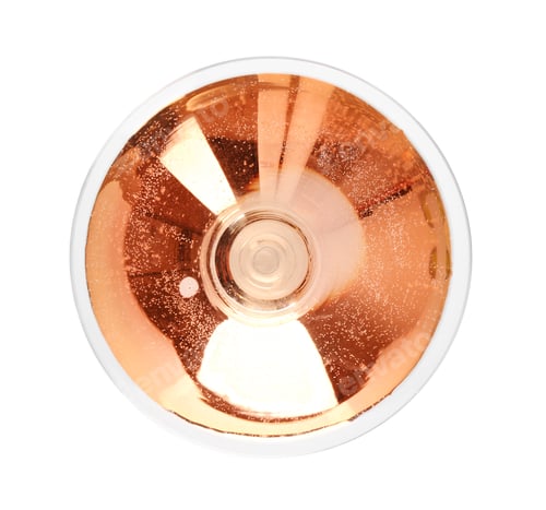 Preview: Glass of rose champagne on white background, top view