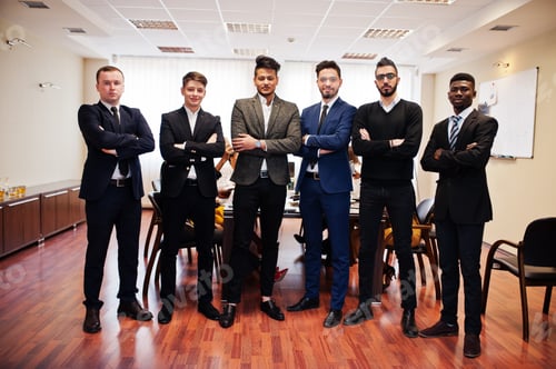 Preview: Multiracial young creative people in modern office