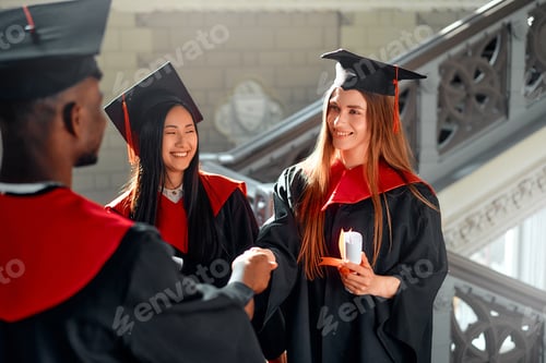 Preview: Diverse Group of Happy Students Graduating, Holding Diplomas and Celebrating Achievement