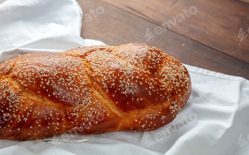 Preview: Easter sweet bread, homemade tsoureki braid on white table cloth