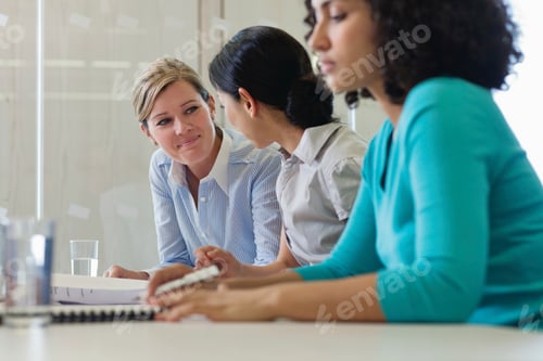 Preview: Office workers sitting in office