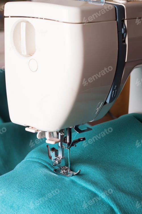 Preview: sewing machine and turquoise fabric