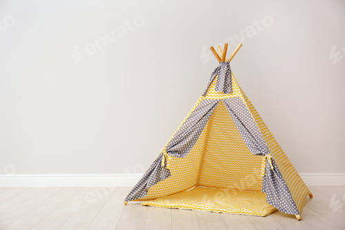 Preview: Play tent for kids near white wall with space for text