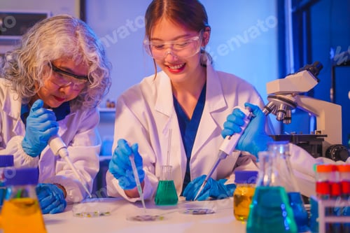 Preview: Two Asian men and women sit at a table in a laboratory, conducting research on liquids. They use