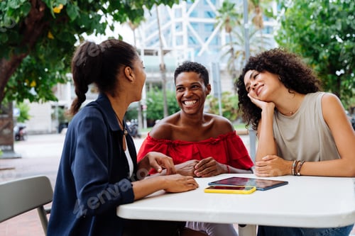 Preview: Three mixed race hispanic and black women bonding outdoors