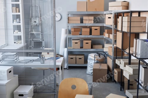 Preview: Part of spacious warehouse with packed boxes standing on shelves