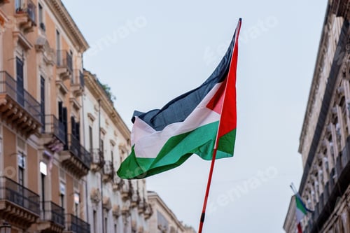 Preview: Palestinian Flag Waving in the City - Symbol of Freedom and Solidarity