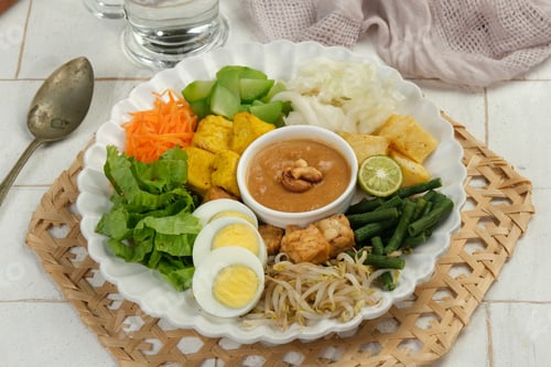 Preview: Gado Gado Indonesian Mix vegetables Salad from Boiled or Steam Vegetable Served with Peanut Sauce.