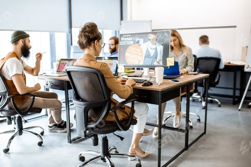 Preview: Web designers working at the office