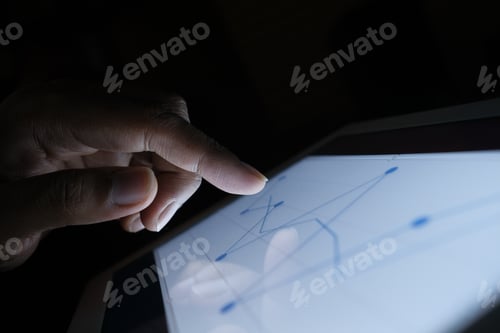 Preview: man's hand working on digital tablet on office desk