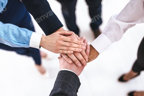 Preview: The business people holding hands