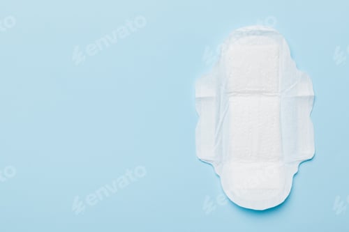 Preview: Women hygiene products or sanitary pad on colored background.