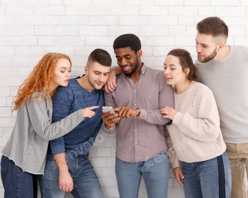 Preview: Man showing video on phone to friends