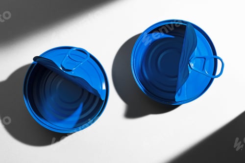 Preview: Painted blue opened tin can with ring on white background